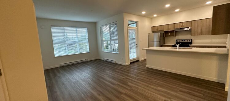 The kitchen and great room of Abbotsford rental apartment at Midtown Club Suites